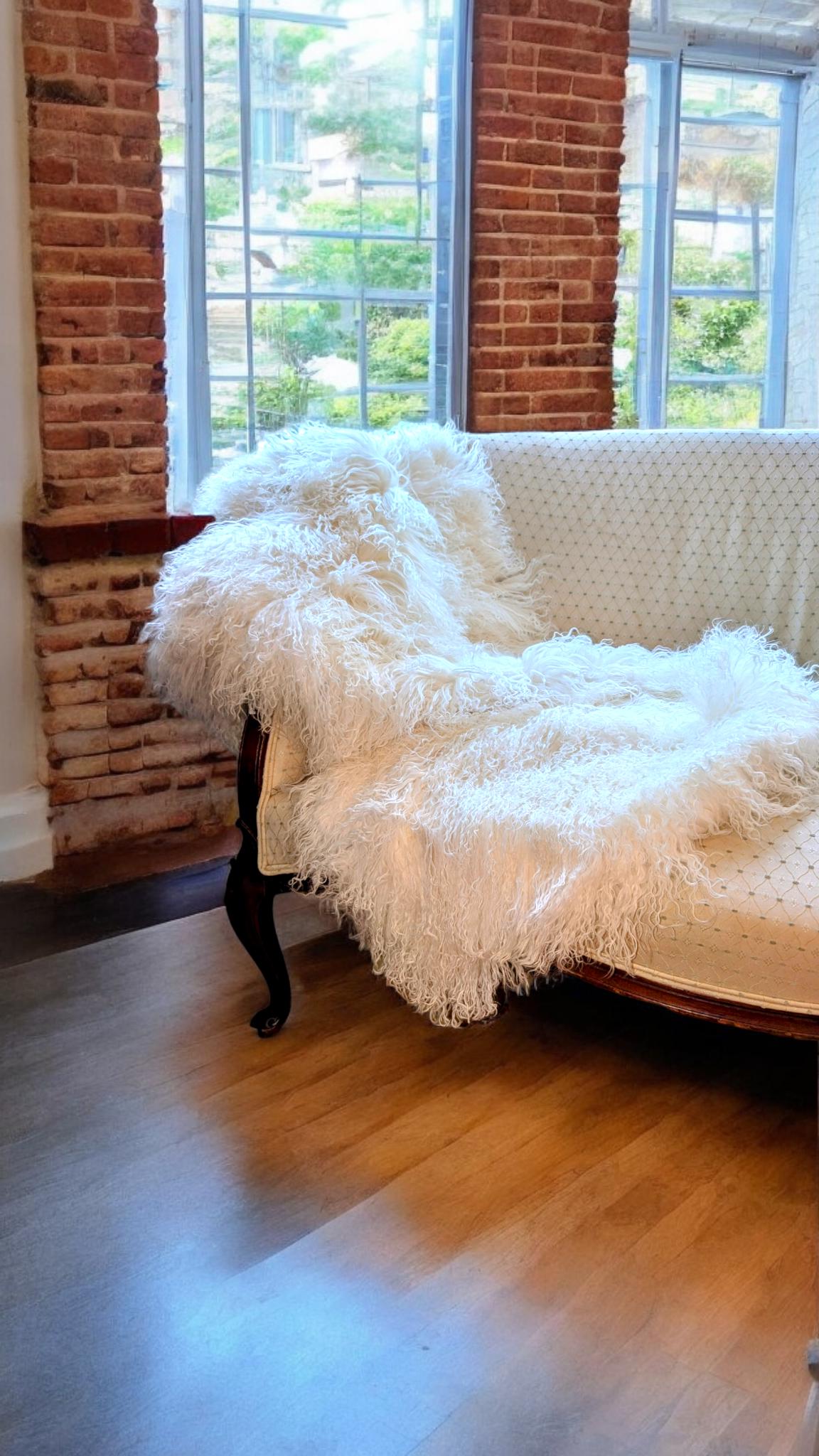 Our Luxurious Genuine Sheepskin Throw. Elevate your home decor with our Luxurious Genuine Sheepskin Throw, a stunning addition that combines comfort, style, and eco-friendliness. Crafted from high-quality, natural sheepskin, this throw rug is designed to bring warmth and sophistication to any room. Stylish home decor. Eco frinedly