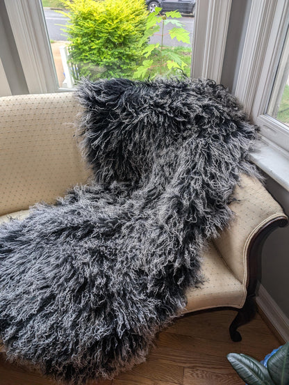 Our Luxurious Genuine Sheepskin Throw. Elevate your home decor with our Luxurious Genuine Sheepskin Throw, a stunning addition that combines comfort, style, and eco-friendliness. Crafted from high-quality, natural sheepskin, this throw rug is designed to bring warmth and sophistication to any room. Stylish home decor. Eco frinedly