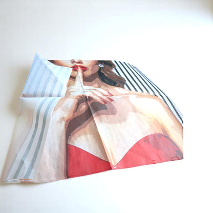 Decoupage paper for furniture.  Elevate your furniture and craft projects with our stunning decoupage paper, featuring the unique &quot;Woman in Red Dress&quot; design. This eye-catching paper combines modern style with whimsical charm, showcasing a stylish woman&#39;s  in striking red dress queuing silence with her finger on her mouth. A powerful blend f a strong beautiful woman against a chic black and white striped background. Perfect for adding a touch of flair to any DIY project!